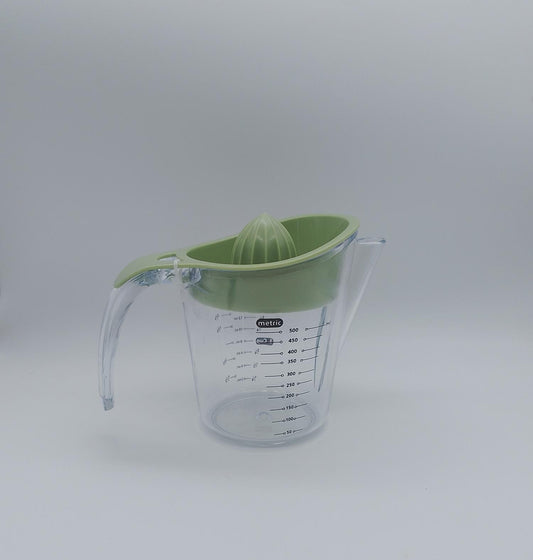 Exprimidor multifuncional de cítricos con taza medidora