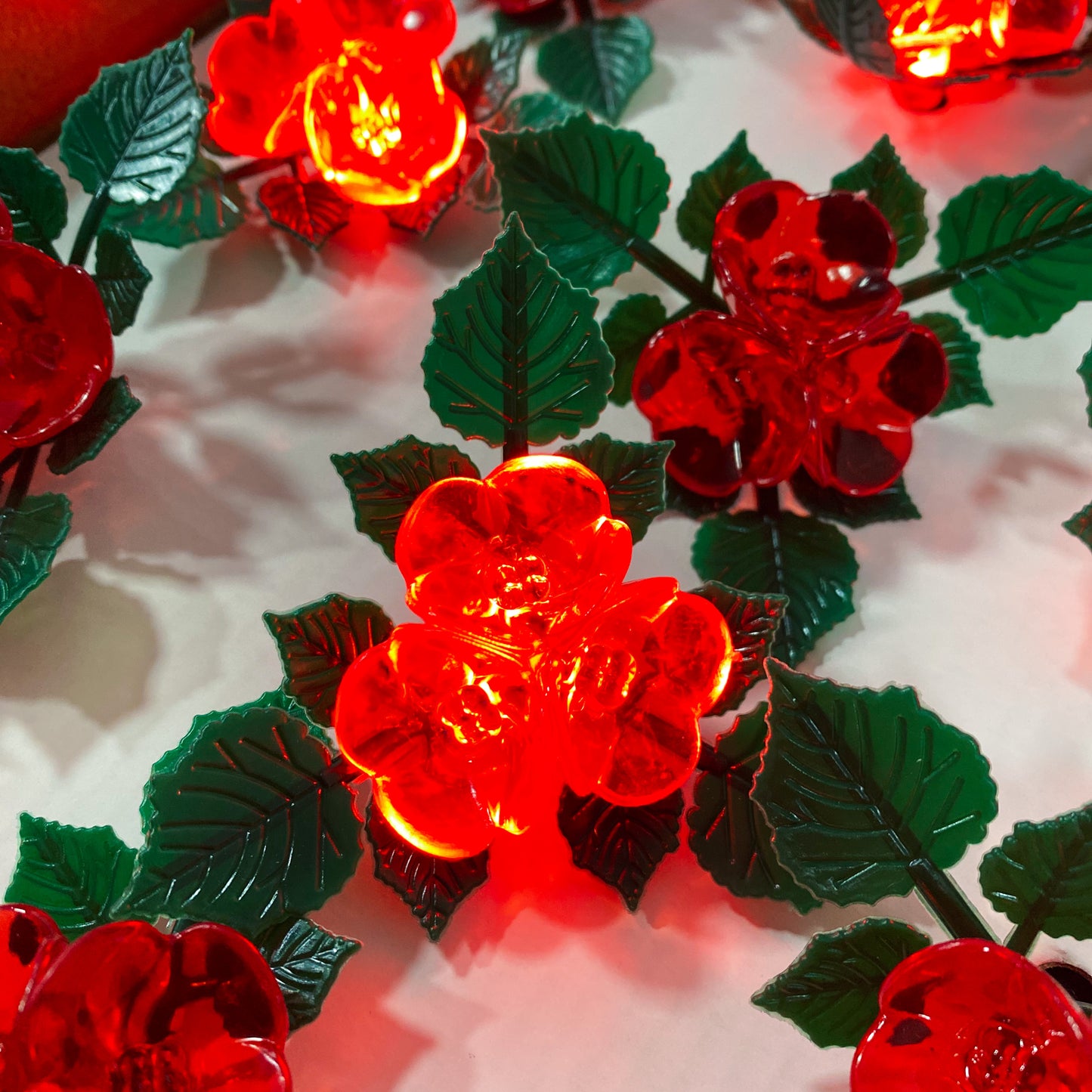 Serie de 24 luces leds en forma de rosas